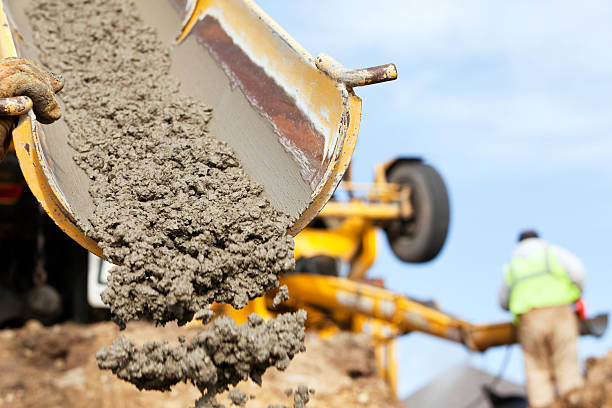 Concrete mixers and finishing tools for construction projects